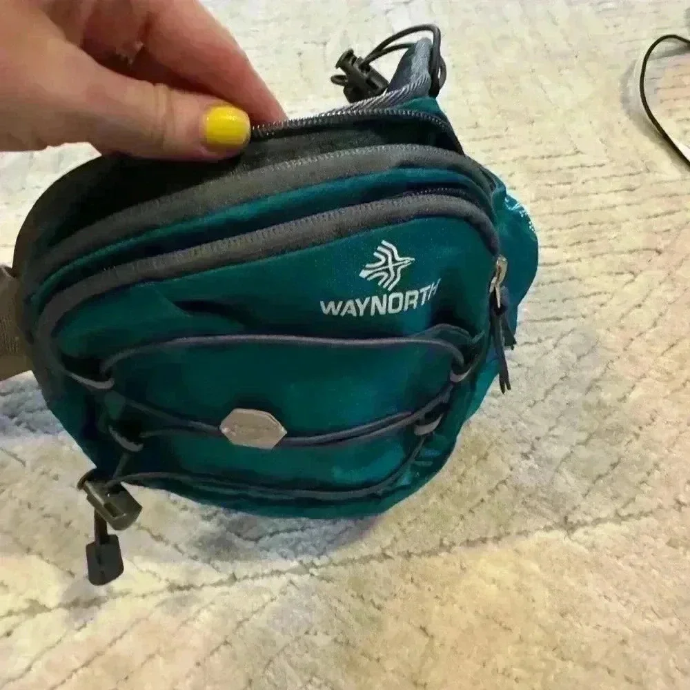 Perfect size with water bottle holder.
